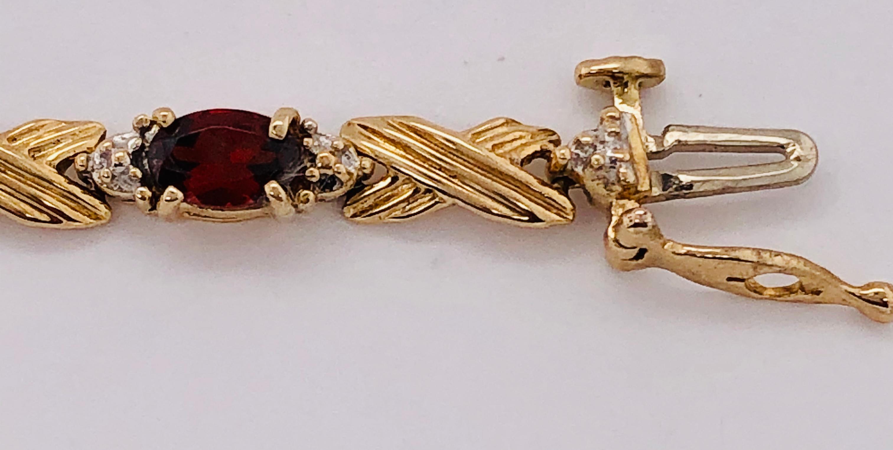 14 Karat Yellow Gold Braided Link Bracelet with Garnets and Diamond Accents For Sale 4