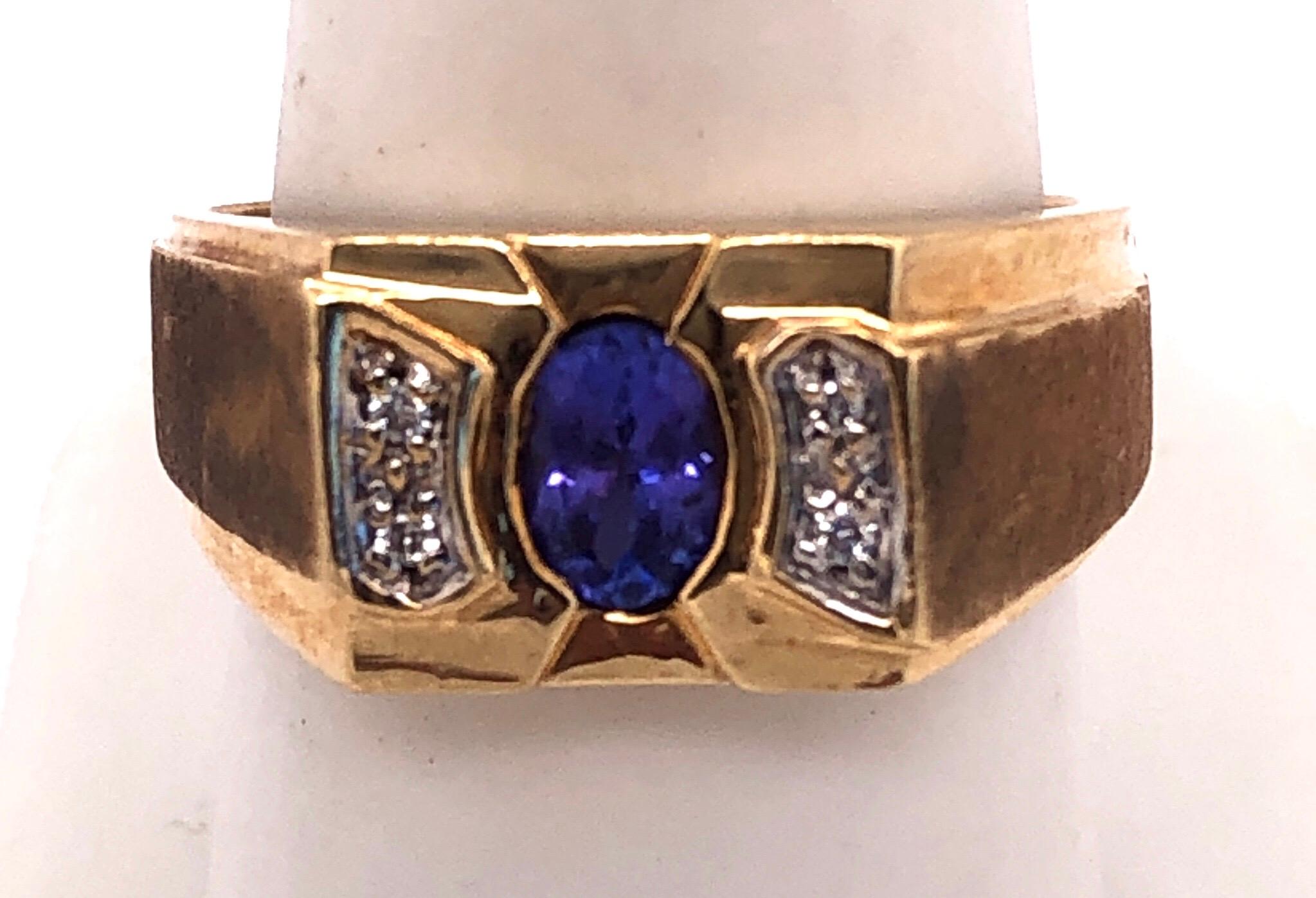 14 Kt Yellow Gold Contemporary Topaz And Diamond Ring
Size 9 
8 grams total weight