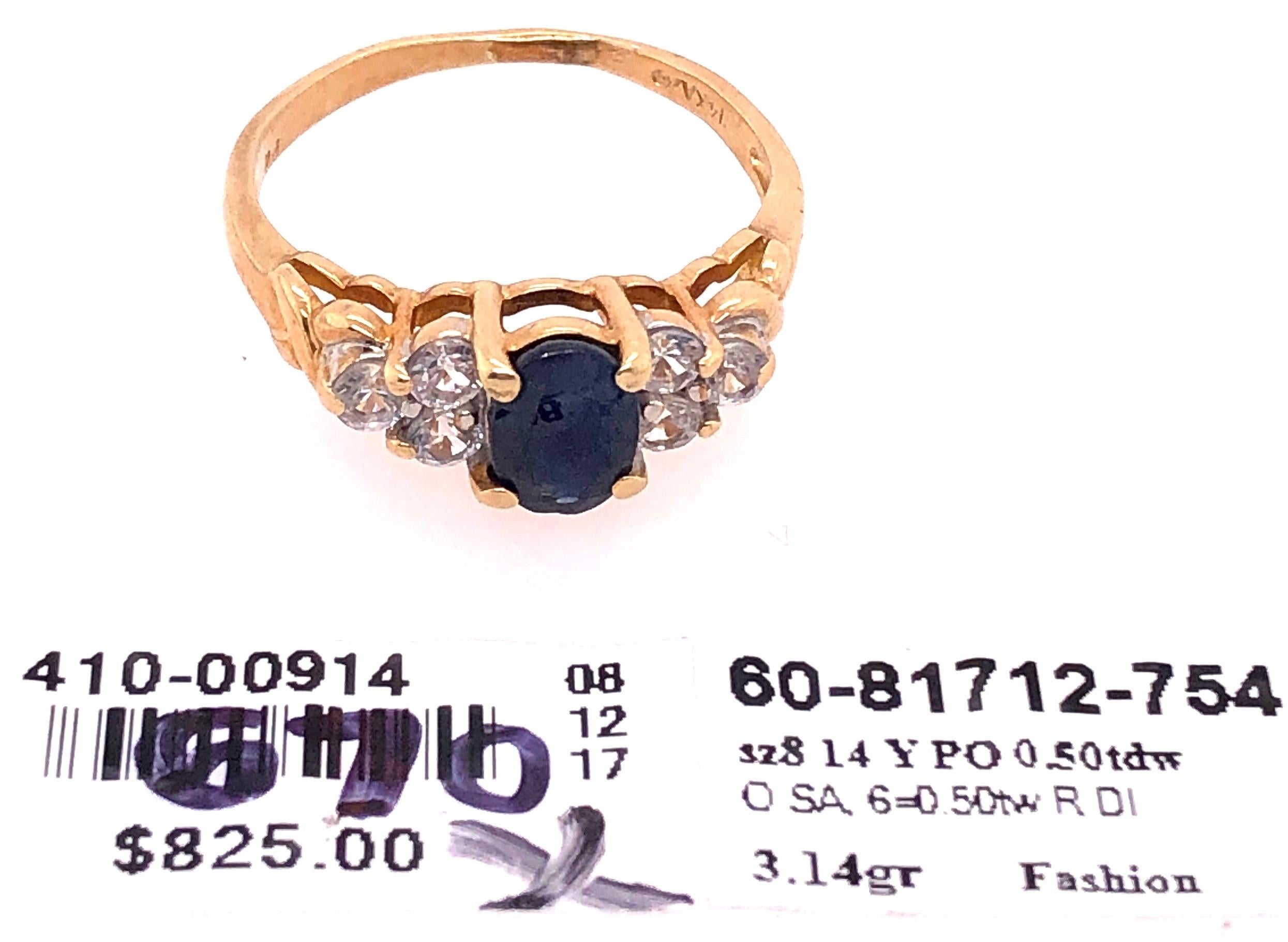 14 Karat Gold Fashion Ring Center Oval Sapphire and Diamond Accent 0.50 TDW For Sale 2