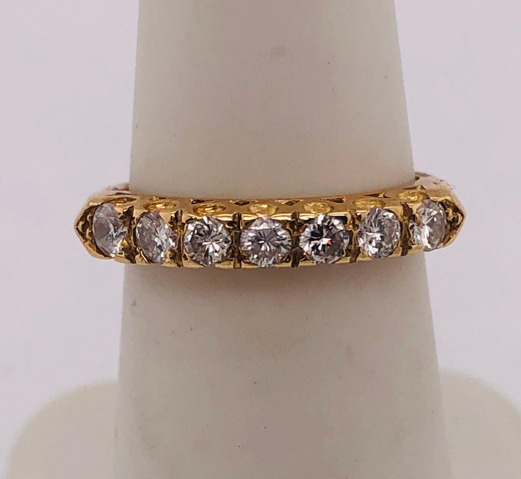 Women's or Men's 14 Karat Yellow Gold Seven Diamond Anniversary Ring Wedding Band 0.70 TDW For Sale