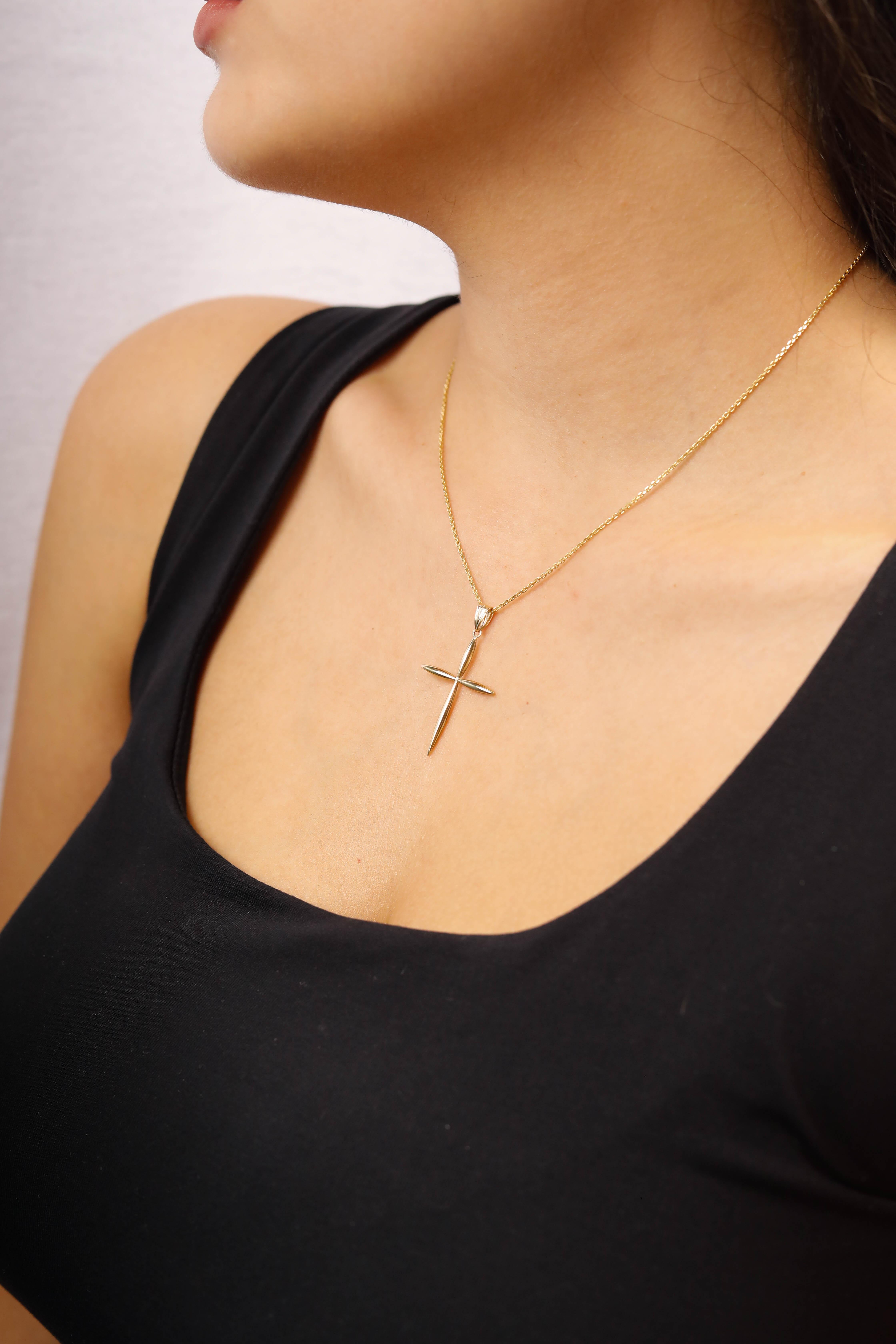14 Karat Yellow Gold Slim Modern Cross Pendant Christmas GIft

These delicate cross pendants are crafted in solid 14 karats yellow gold. Modeled after traditional jewelry, these pendants are with cross Design take on the classic gold