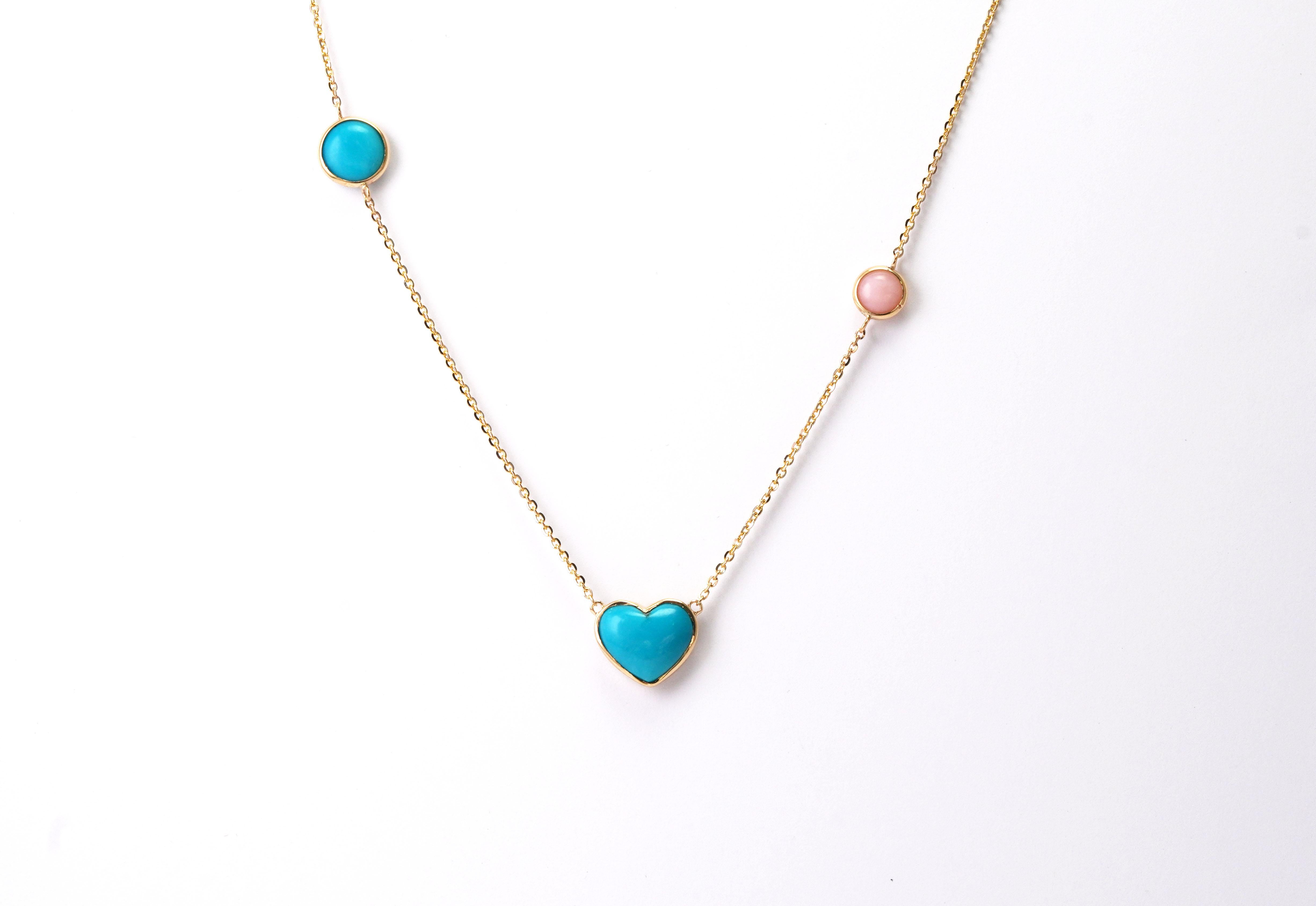 14 kt Gold Necklace with Turquoise and Pink Opal
Gold color: Yellow
Dimensions: 44-48 cm Length
Total weight: 4.02 grams

Set with:
- Turquoise
Color: Blue
Cut: Cabochon
 - Opal
Color: Pink
Cut: Cabochon

