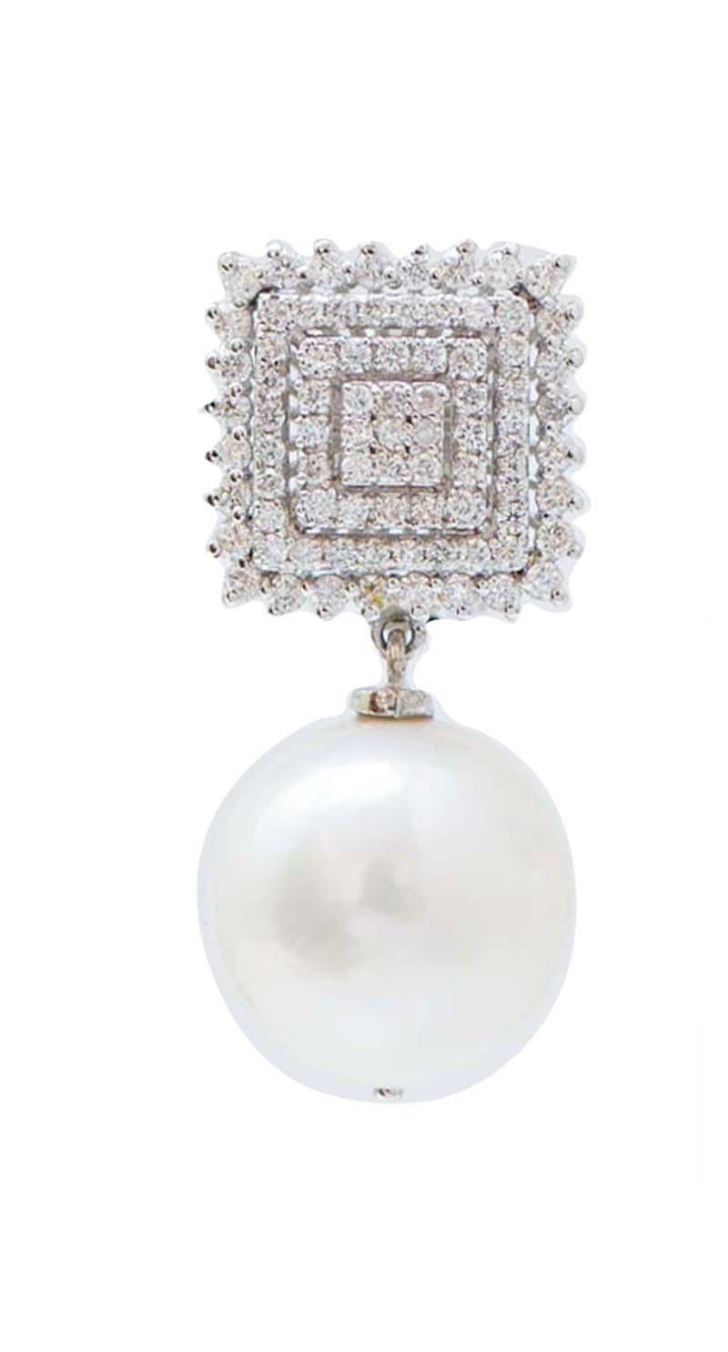 Eleganti orecchini pendenti in oro bianco 18 kt con diamanti nella parte superiore e una perla come pendente.
Diamanti 1,84 ct
Perle 7.50 gr
Peso totale 15.80 gr
RF   G    ICOF
RK.GUUH98

Per qualsiasi informazione, non esitare a contattare il
