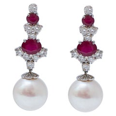 14 Mm Pearls, Diamonds, Rubies, Platinum Earrings.