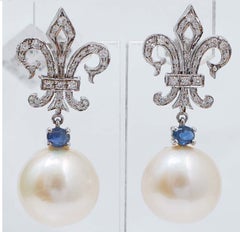 14 Mm Pearls, Sapphires, Diamonds, 14 Karat White Gold Earrings.