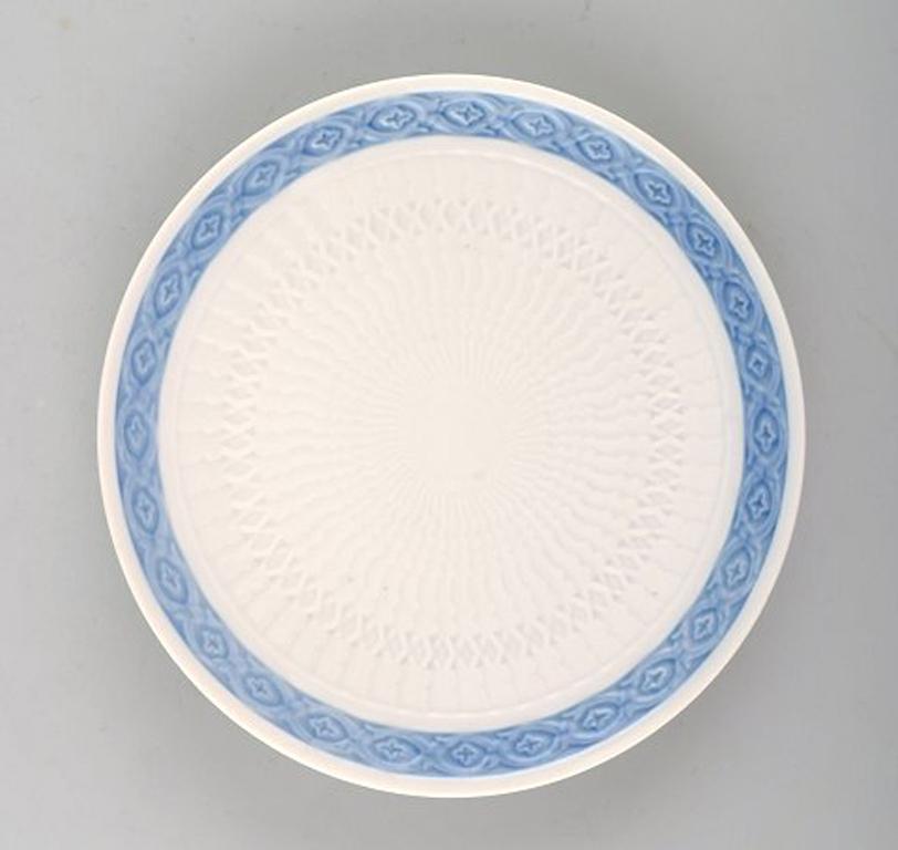 14 pieces, Royal Copenhagen blue fan, cake plates.
Designed by Arnold Krog in 1909.
Decoration Number 1212/11533.
Measures: Diameter 16 cm.
In perfect condition, 1st sort.
