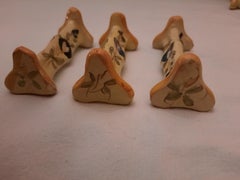 14 Quimper Style Yellow Framed Knife Rests C1920