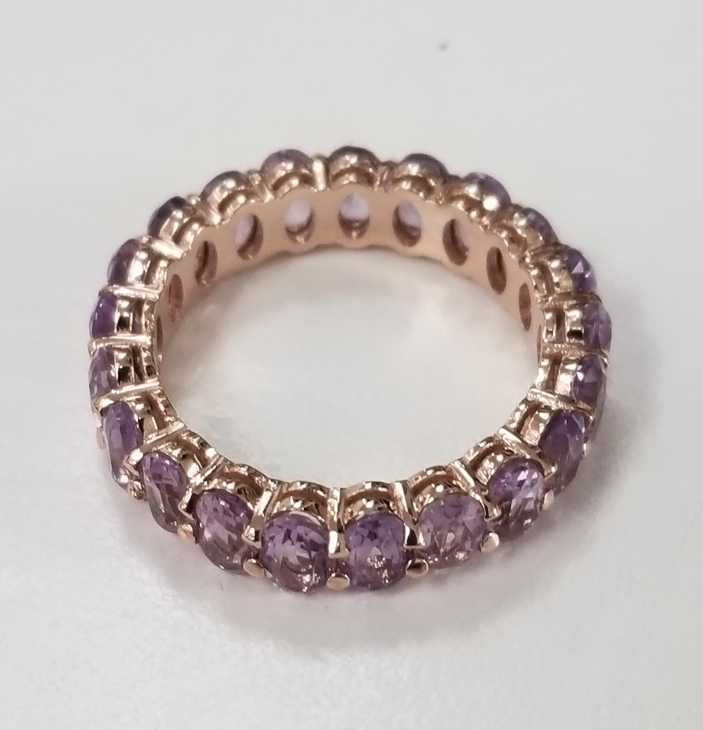 14 rose gold Amethyst oval cut eternity ring, containing 22 oval cut amethyst of gem qualilty weighing 5.02cts.  the ring is a size 7, we can make a new ring to fit for an adjusted price either up or down, depending on the size.