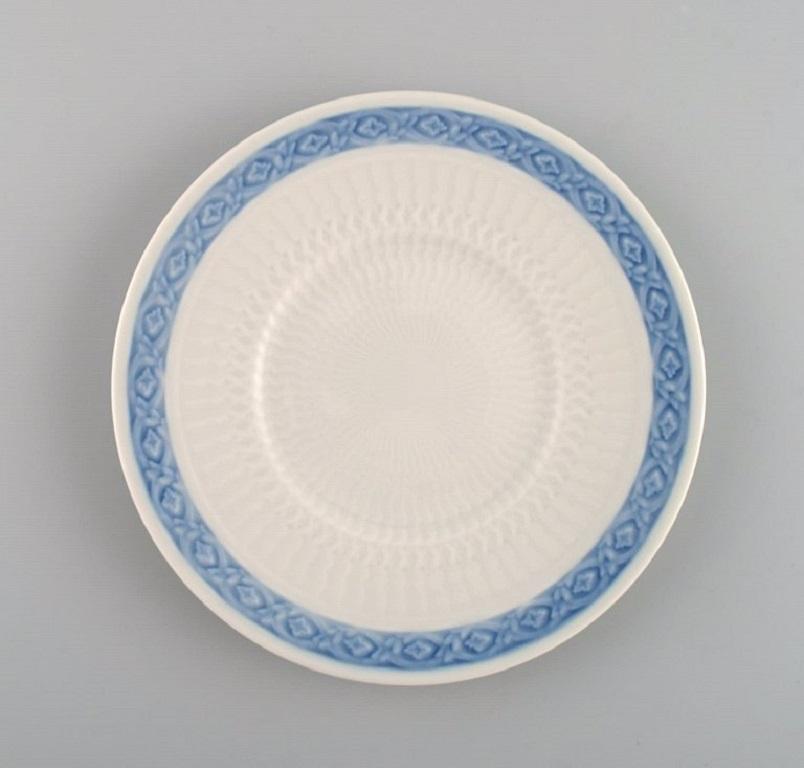 14 Royal Copenhagen blue Fan side plates. 1960s. 
Model number 1212/1522. Designed by Arnold Krog in 1909.
Measure: Diameter: 15.8 cm.
In excellent condition.
Stamped.
1st factory quality.