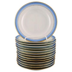 14 Royal Copenhagen Plates in Hand Painted Porcelain, Blue Border with Gold