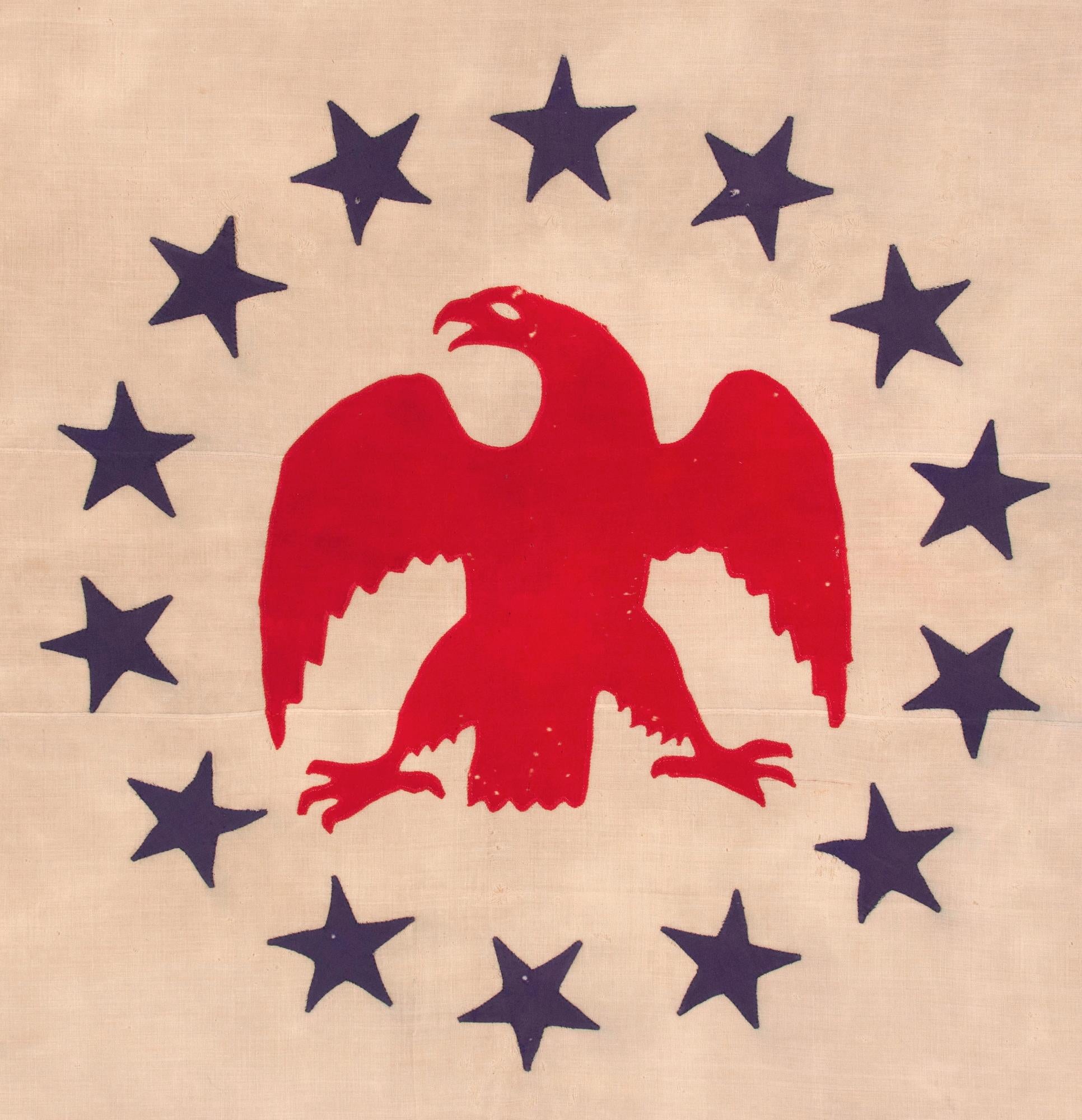 ENTIRELY HAND-SEWN FLAG WITH AN APPLIQUED FEDERAL EAGLE AND 14 STARS, MADE IN THE 1850’s BY RENOWNED FLAG MAKER SARAH McFADDEN, “THE BESTY ROSS OF NEW YORK,” FOR THE HUDSON RIVER STEAMSHIP “DELAWARE,” LAUNCHED, 1852; CONSCRIPTED INTO FEDERAL SERVICE
