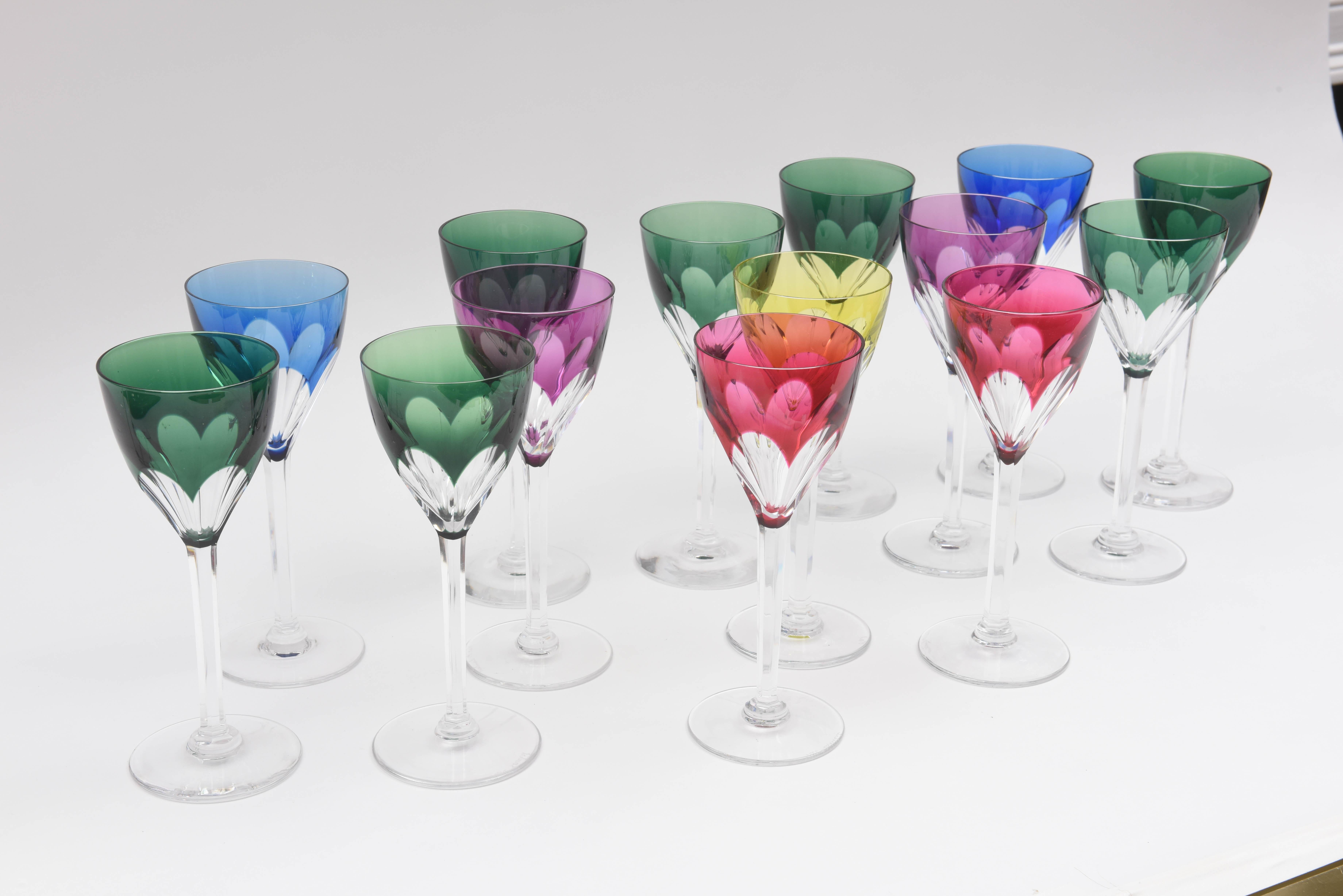 A beautiful and vibrant set of exquisitely blown and cut wine glasses. These will mix and match nicely with your Fine clear stems as well as any jewel color of cobalt blue, emerald green, ruby , amethyst and citrine. Crisp cut stems and when you