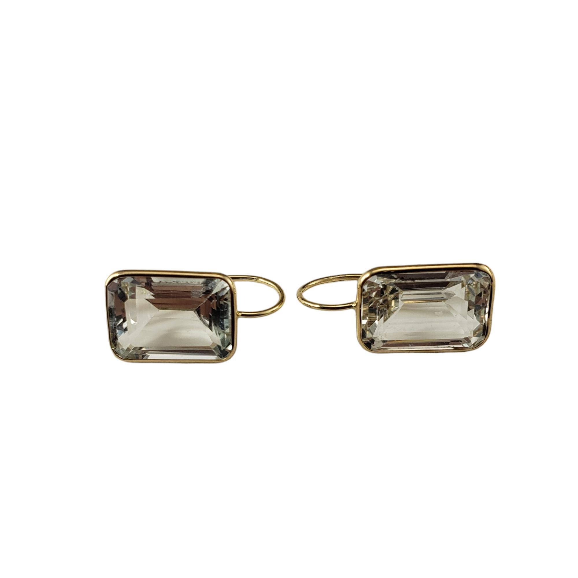14 Karat Yellow Gold and White Topaz Earrings JAGi Certified

These stunning earrings each feature one emerald cut topaz (14 mm x 9.5 mm) set in classic 14K yellow gold.

Total topaz weight:  16.7 ct.

Size: 21.5 mm x 11 mm 

Stamped: 14K

Weight: