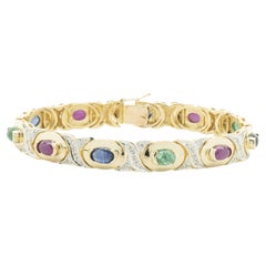 14 Yellow Gold Cabochon Cut Sapphire, Emerald, Ruby, and Diamond Bracelet