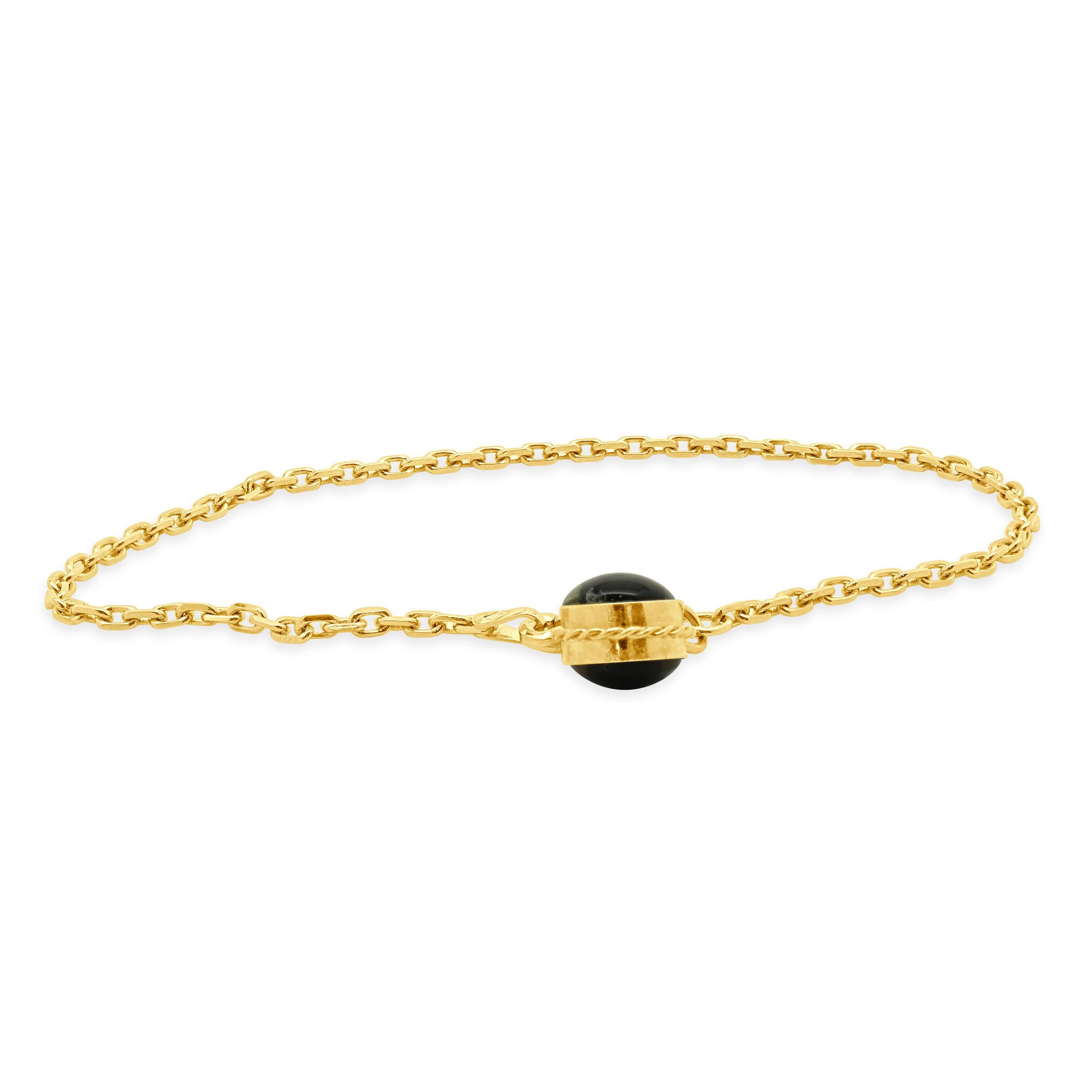 Designer: custom
Material: 14K yellow gold
Weight: 4.30 grams
Dimensions: bracelet will fit up to a 7.25-inch wrist
