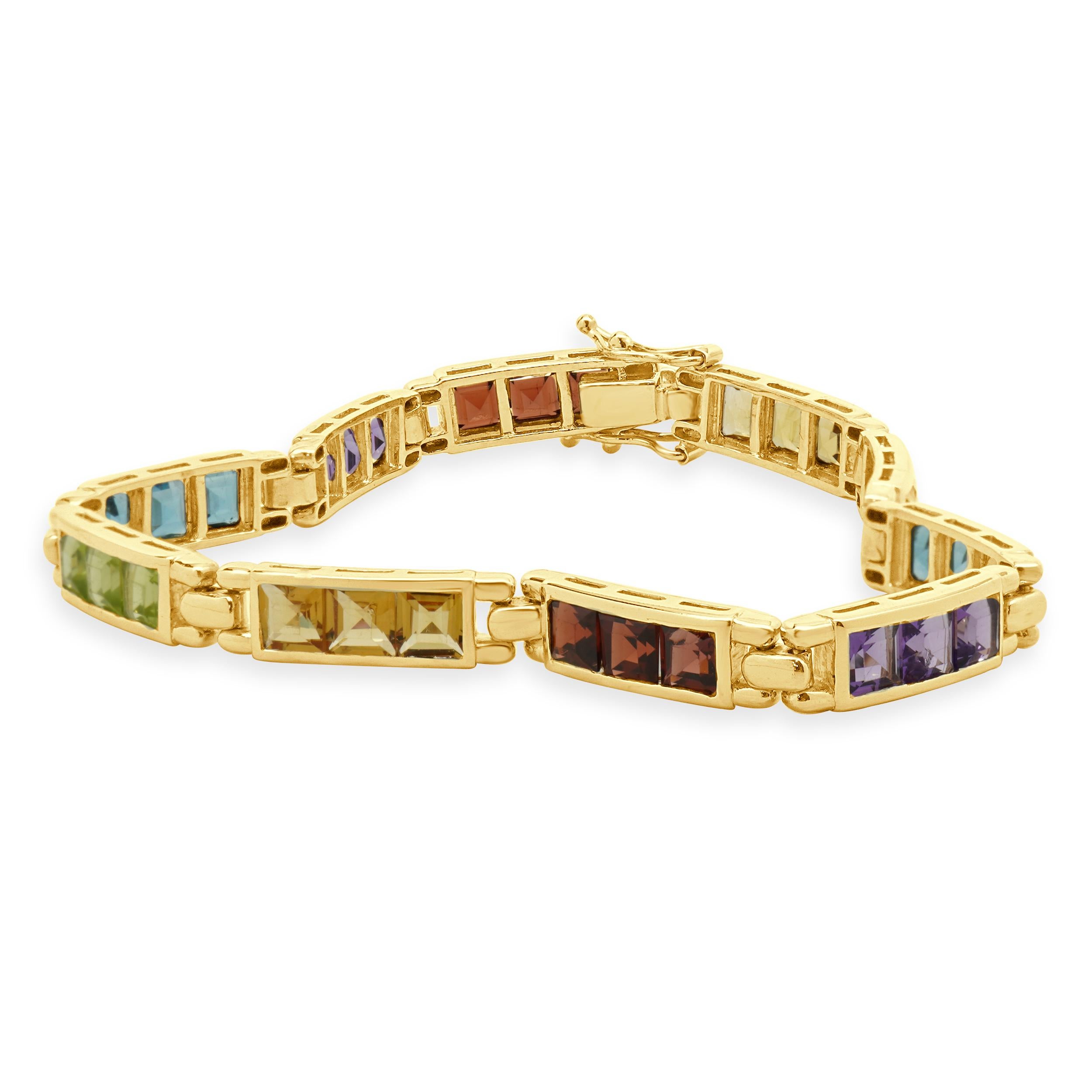 Designer: custom
Material: 14K yellow gold
Gemstones: 30 square cut = 9.00cttw
Weight: 13.77 grams
Dimensions: bracelet will fit up to a 7-inch wrist
