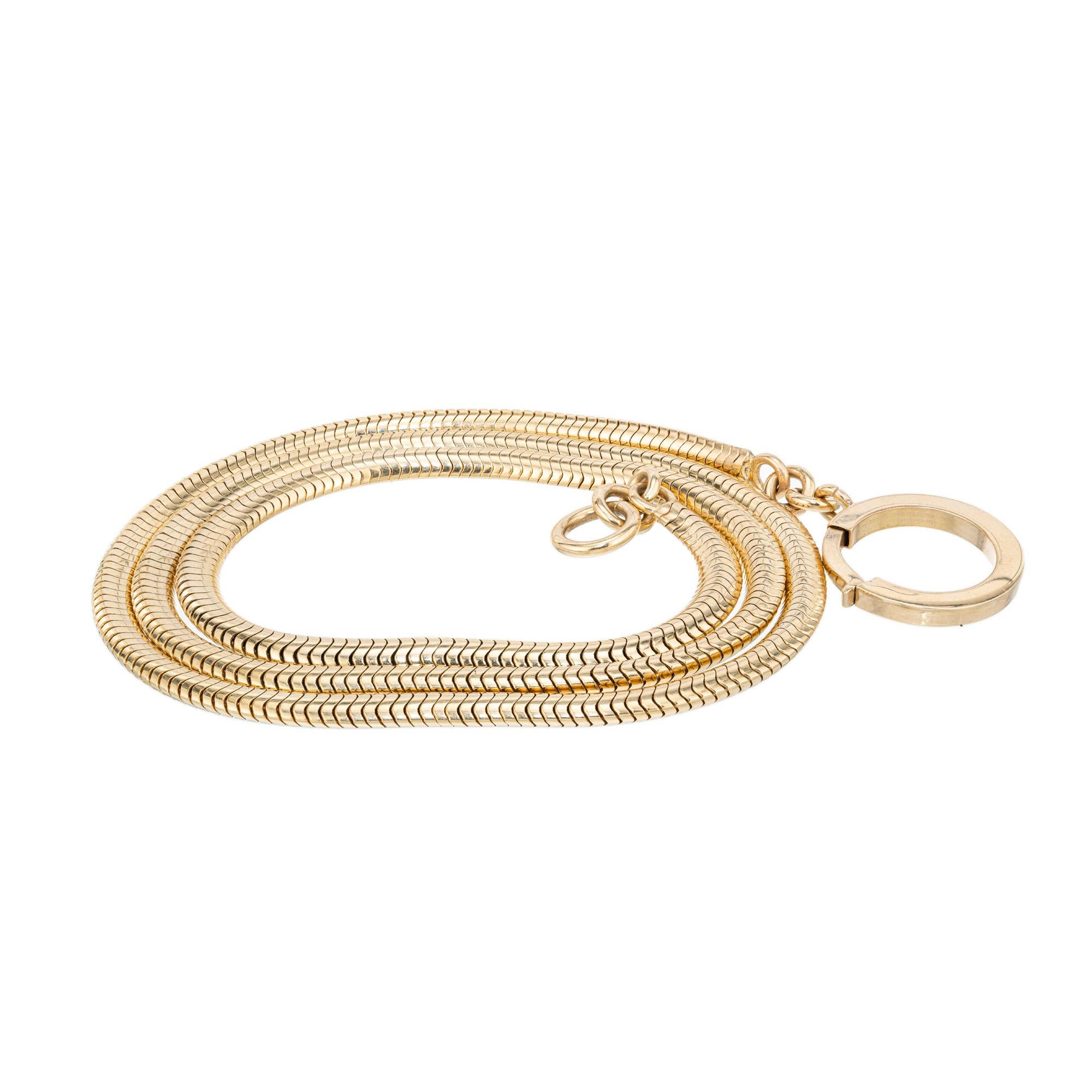 Vintage 1950's 20 Inch 4mm wide snake chain. 3D oval shape. Sport ring and jump ring ends. Suitable for a watch chain or necklace.

14k yellow gold 
Stamped: 14k
35.4 grams
Width: 4mm
Thickness/depth: 2.5mm
Chain: 20 Inches

Please Note, we