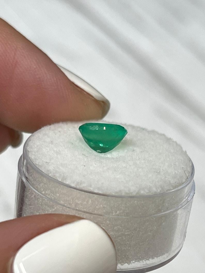 Women's 1.40 Carat Apple Green Colombian Emerald - Oval Cut May Birthstone Gem For Sale