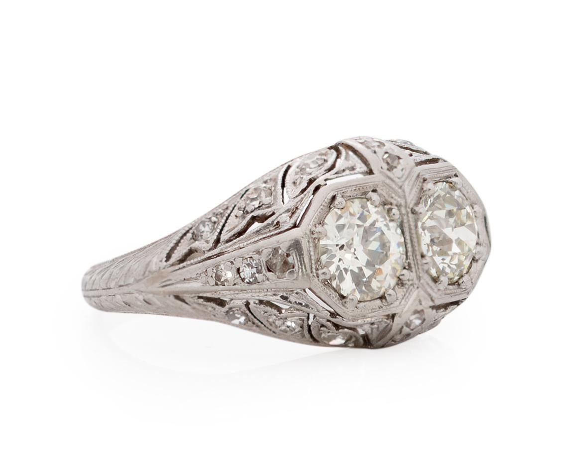 Item Details: 
Ring Size: 5.75
Metal Type: Platinum [Hallmarked, and Tested]
Weight: 4.0 grams

Diamond Details:
Weight: 1.40 Carat, total weight
Cut: Old European brilliant
Color: M/N
Clarity: SI1

Side Stone Details:
Weight: .15 Carat Total
