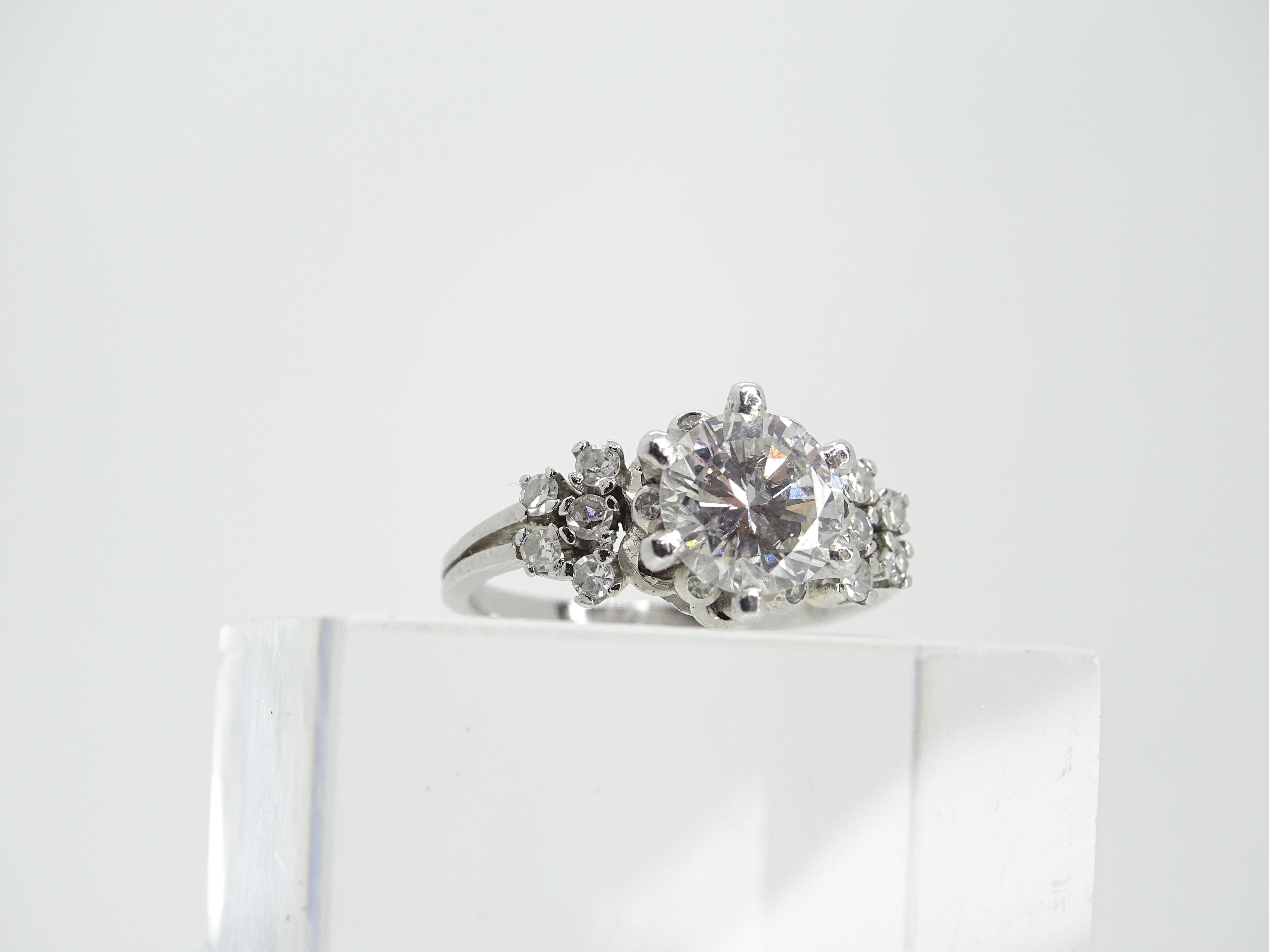 Brilliant Cut 140 Carat, Art Deco Solitaire Ring Diamond and 16 Diamonds 025 Carat