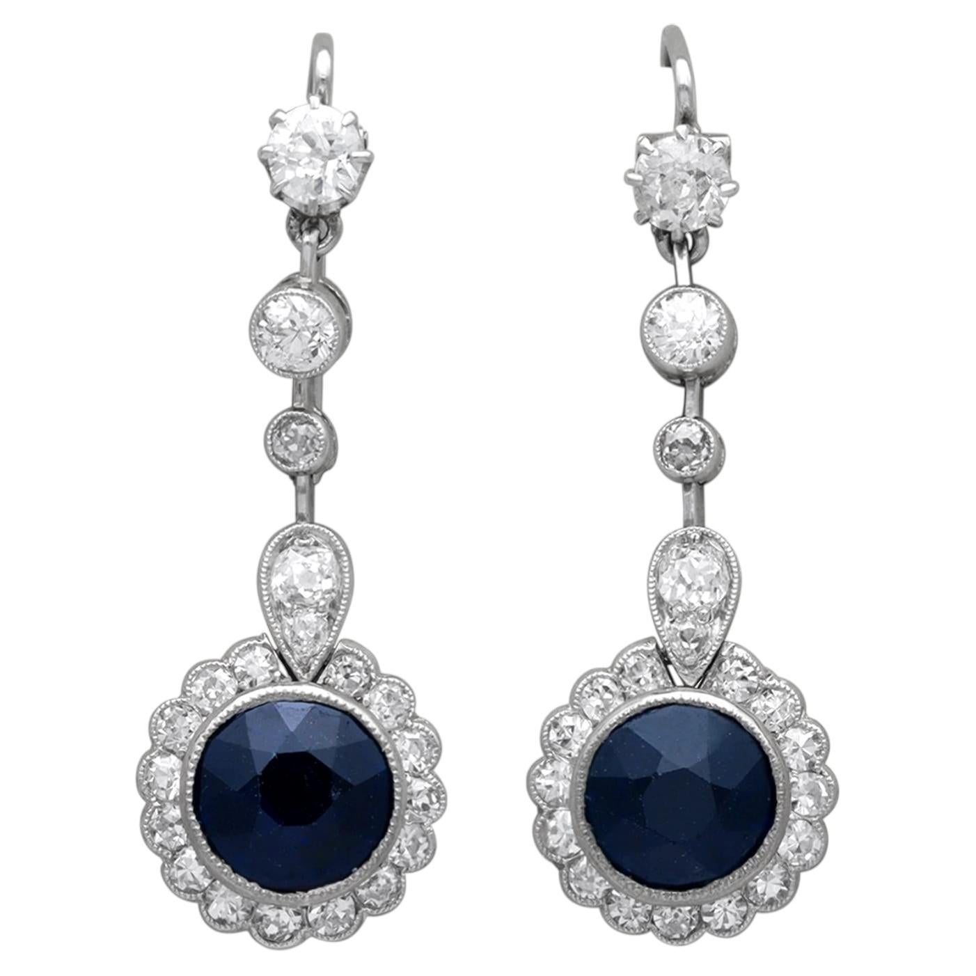 2.60 Carat Basaltic Sapphire 1.32 Carat Diamond Platinum Earrings Circa 1920 For Sale