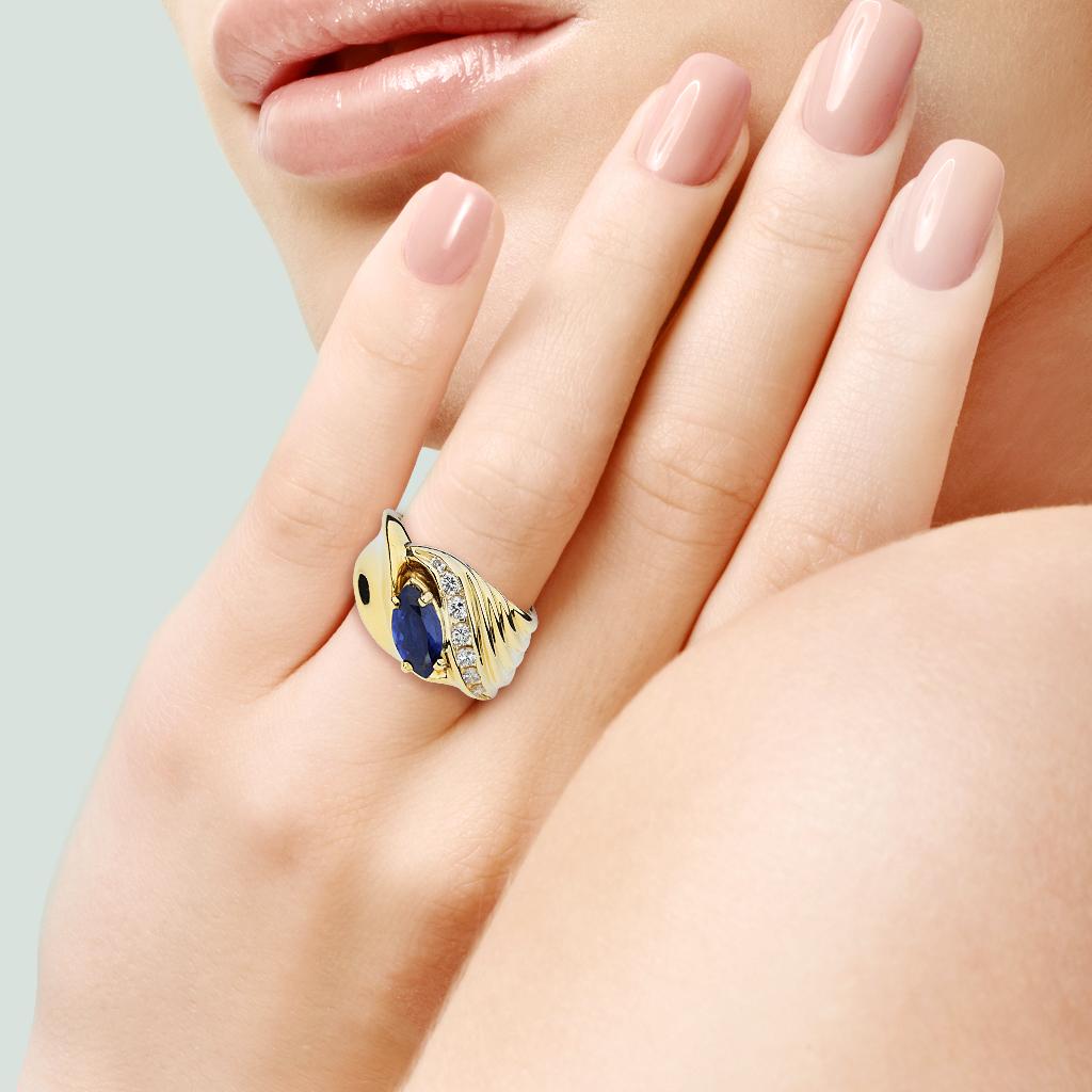 A substantial 14k yellow gold setting is the only type worthy of this 1.40ct marquise deep blue sapphire and diamond ring.

Hallmarks: 14K, 3R

Center Gemstone
Gemstone: Blue Sapphire
Carat Weight: 1.40 ct
Shape: Marquise
Gemstone Measurements: 10 x