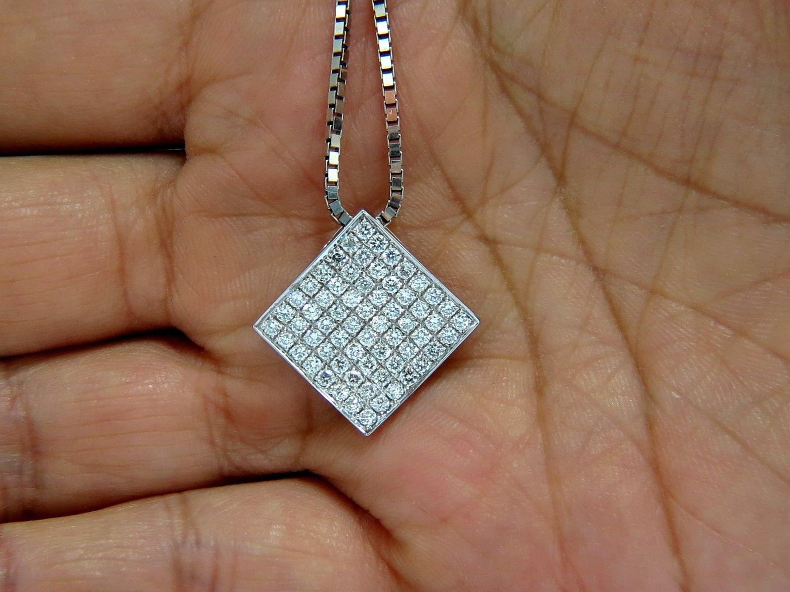 Mod Zen Deco Pendant & Chain

1.40ct. Diamonds

Micro / Bead Set

Rounds, Full cuts 

 G color, Vs-2 clarity. 

Very Good, Excellent cuts. 

Selected from the finest parcels. 


14KT Solid white gold 

Form of a Zen Plate with 3D curve on