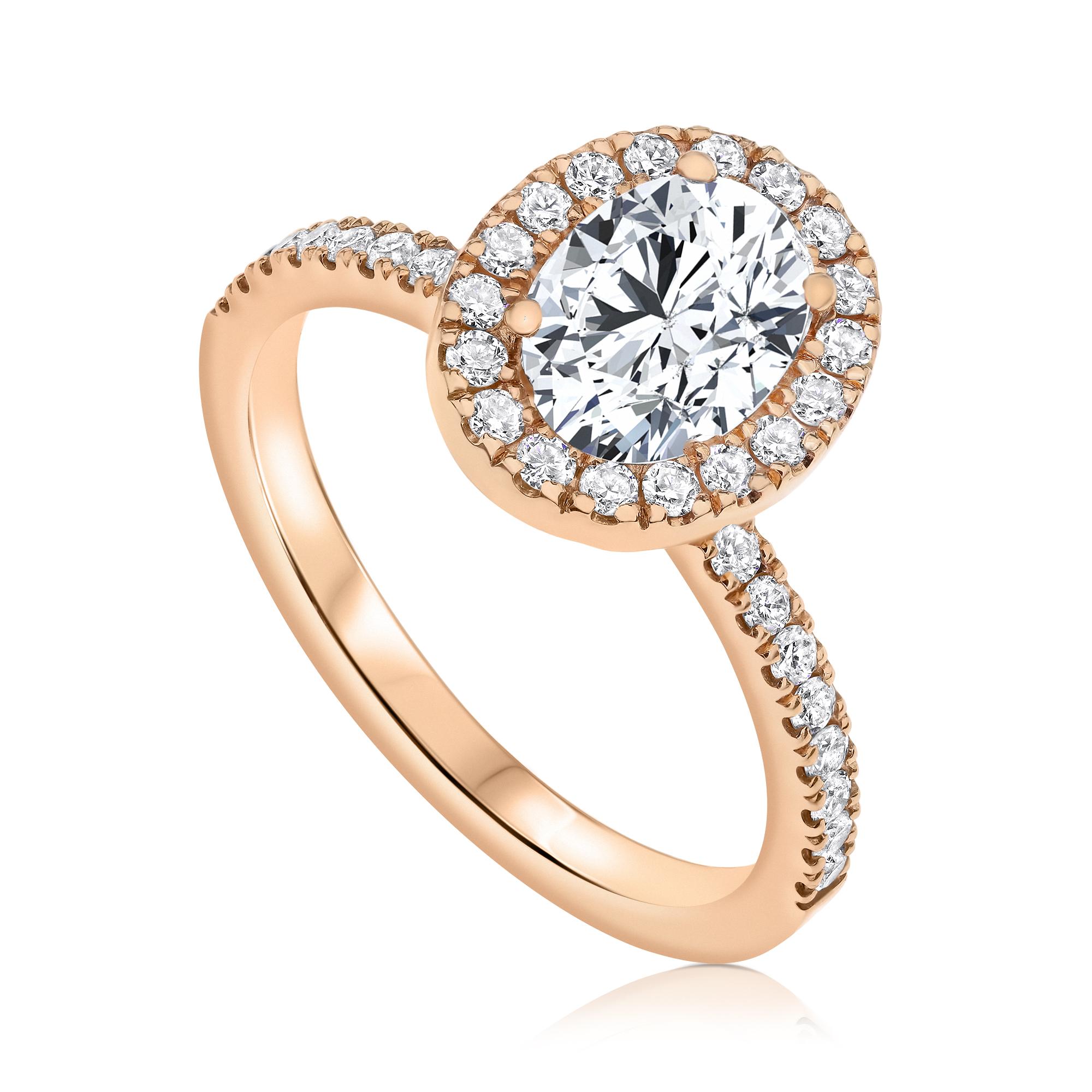 1.40 Carat EGL Certified Oval Shaped Diamond Halo Ring in 14 Karat Rose Gold 

Shlomit Rogel's halo diamond ring is a gorgeous engagement ring set with all natural shiny excellent cut diamonds. Center diamond is oval shaped 1.00 carat EGL certified