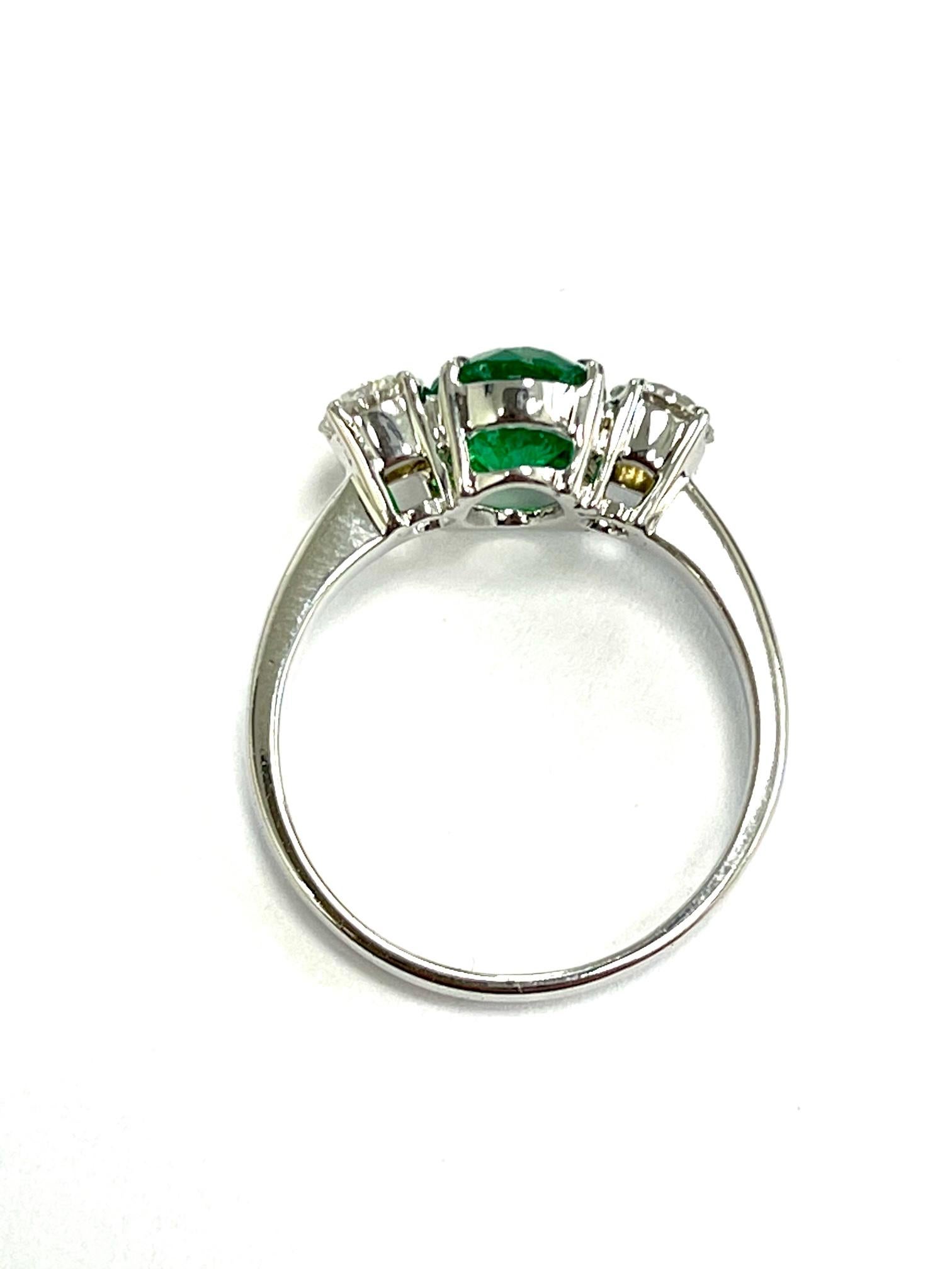 Oval Cut 1.40 Carat Emerald Diamond Three-Stone Ring For Sale