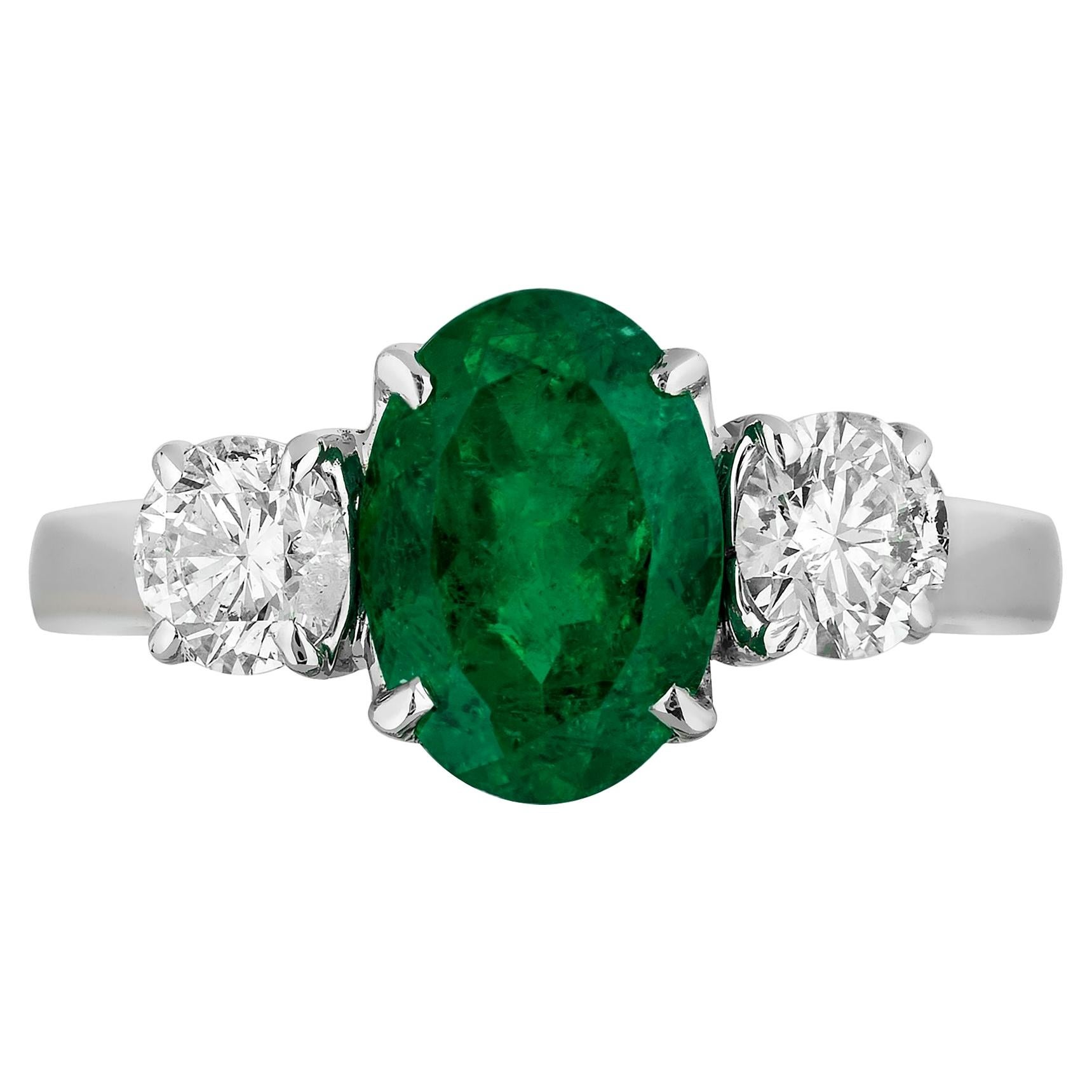 1.40 Carat Emerald Diamond Three-Stone Ring For Sale