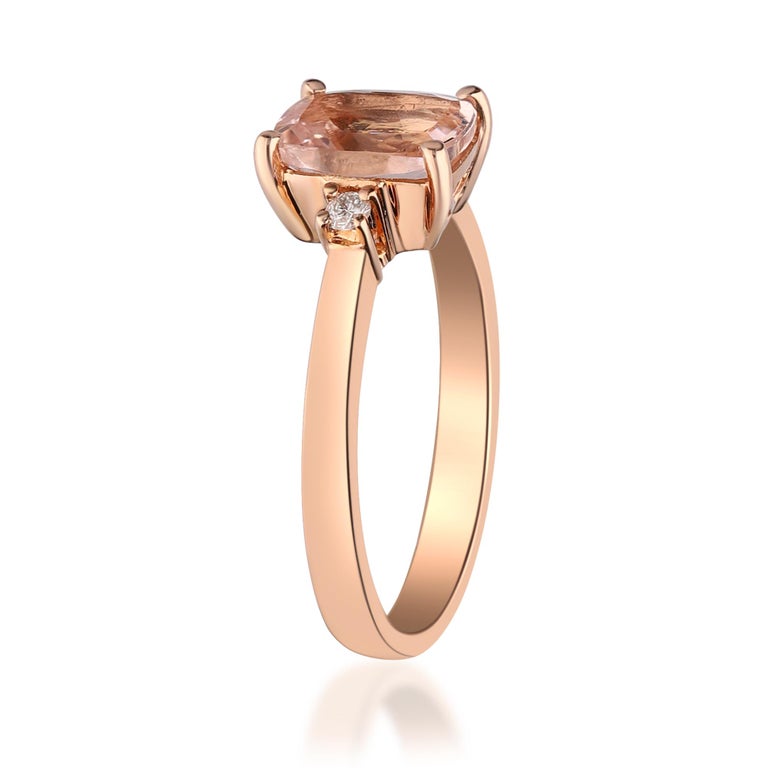 Stunning, timeless and classy eternity Vintage ring. Decorate yourself in luxury with this Gin & Grace ring. This ring is made up of 9x7 MM Cushion-Cut Prong Setting Morganite (1 pcs) 1.40 Carat and Round-Cut Prong Setting Diamond (2 pcs) 0.05 Carat