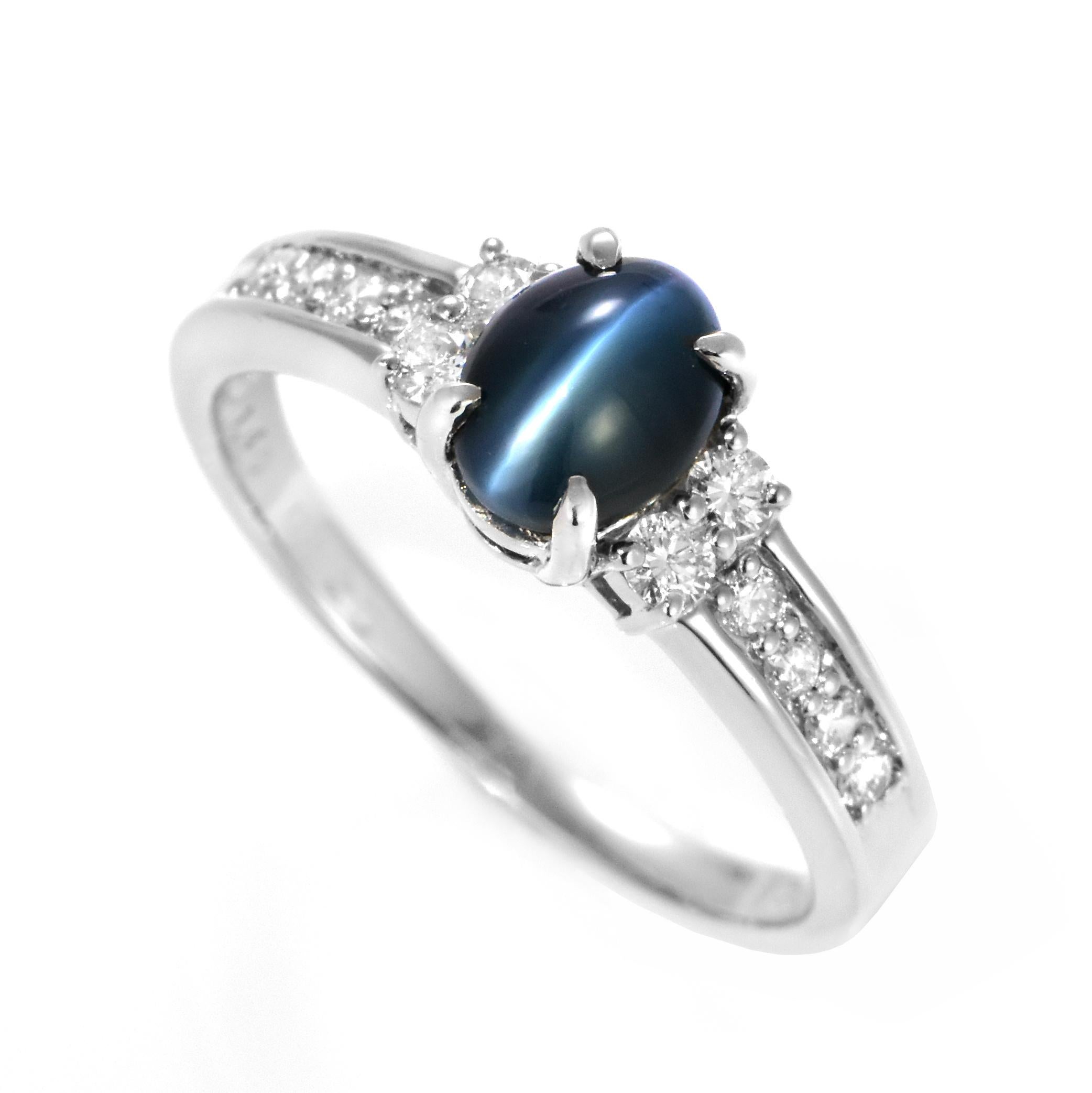 A gorgeous ring featuring 1.40 Carats, Natural Alexandrite Cat's Eye and 0.25 Carats of Diamond Accents set in Platinum. Alexandrites produce a natural color-change phenomenon as they exhibit a Bluish Green Color under Fluorescent Light whereas a