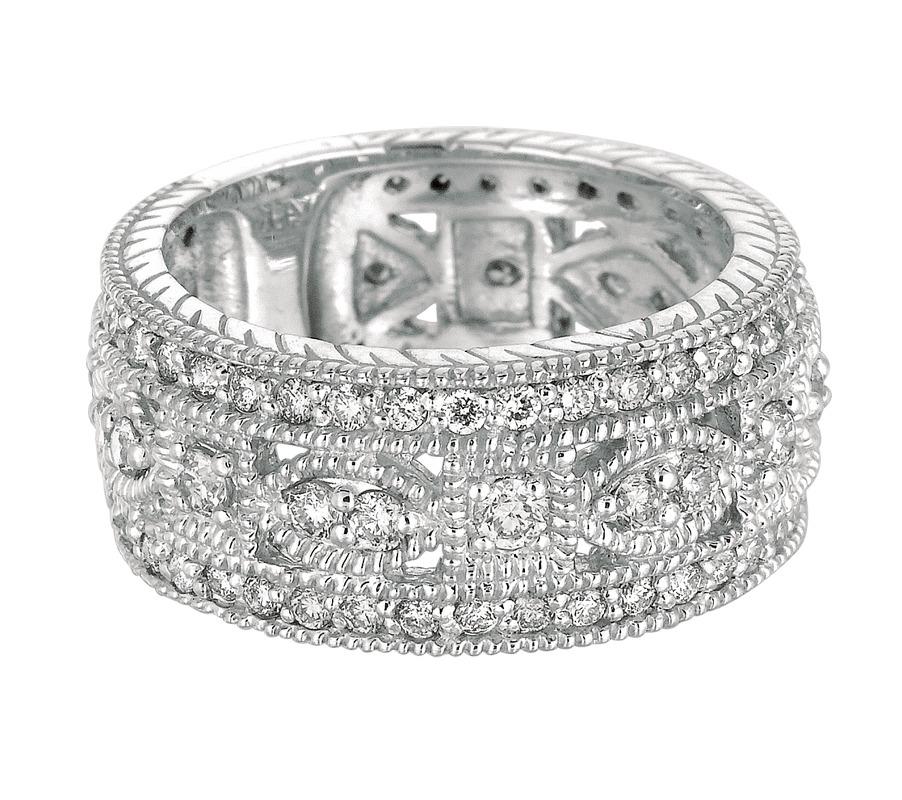 Diamond Eternity Ring G SI 14K White Gold

100% Natural Diamonds, Not Enhanced in any way Round Cut Diamond Eternity Band 
1.40CT
G-H 
SI  
14K White Gold  Prong style   8.79 grams
9 mm in width 
Size 7
80 diamonds - 1.10ct, 6 diamonds - 0.30ct