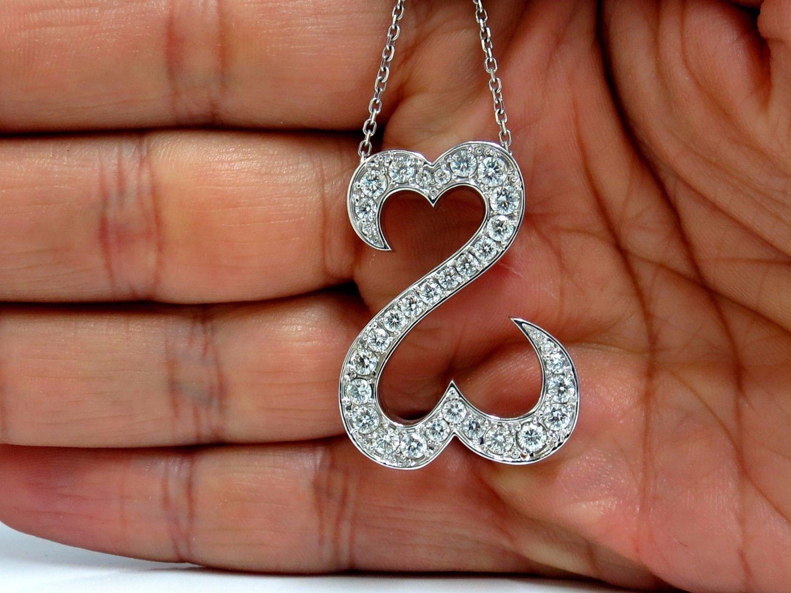 Double Heart Diamonds Necklace.

1.40ct. Natural Diamonds

Round, Brilliant full cuts:

H color Si-1 clarity.

14Kt White gold 

Pendant measures: 1.3 Inch X 1 Inch.


Necklace: 16 Inches.
Grand weight: 14 Grams.


$5000 Appraisal will accompany