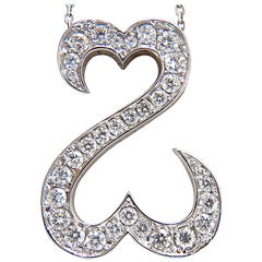 1.40 Carat Natural Diamonds Double Heart Pendant 14 Karat*