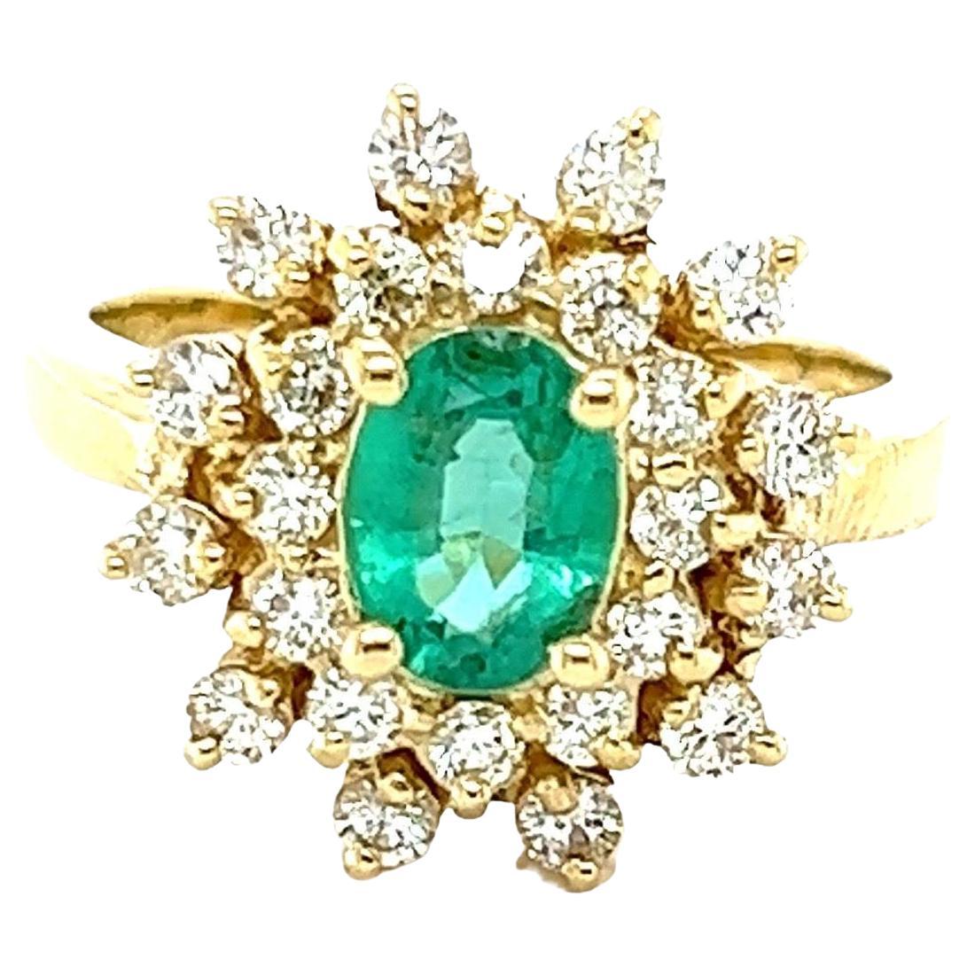 1.40 Carat Natural Emerald Diamond 14 Karat Yellow Gold Engagement Ring

This ring has a 0.74 Carat Oval Cut Emerald and is surrounded by Natural Round Cut Diamonds that weigh 0.66 Carats. (Clarity: SI, Color: F) The total carat weight of the ring
