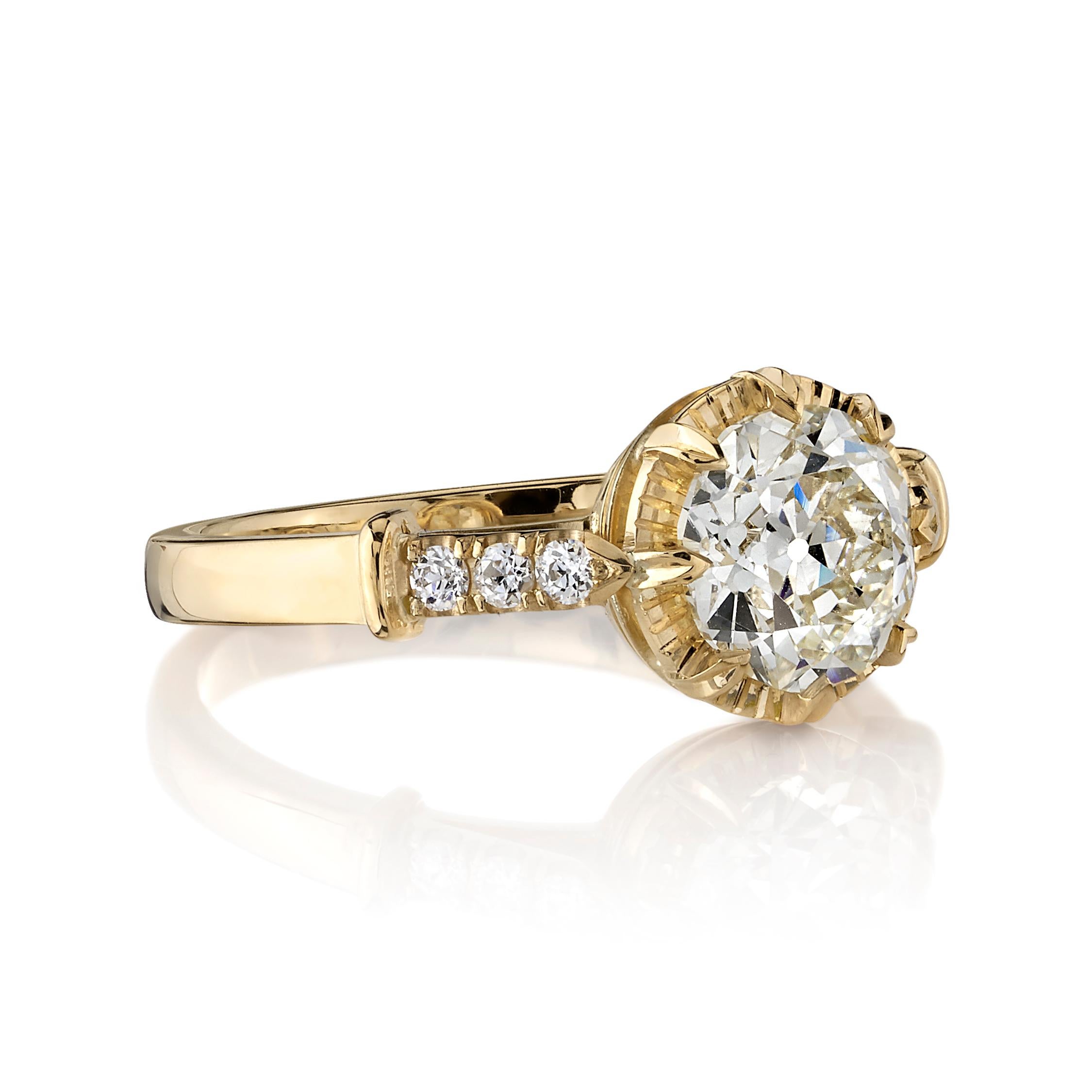 1.40ctw M/VS2 GIA certified old European cut diamond with 0.11ctw old European cut accent diamonds set in a handcrafted 18K yellow gold mounting.

Ring is currently a size 6 and can be sized to fit.