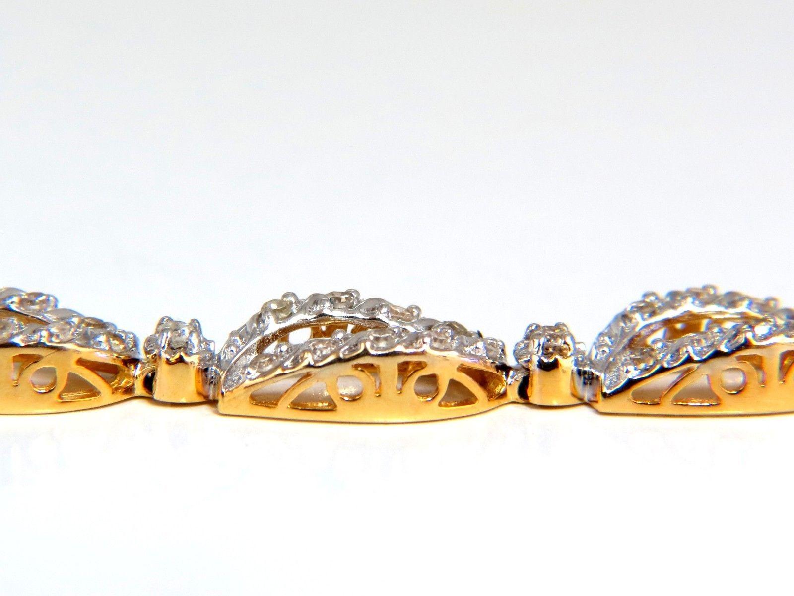 Open leaf pattern diamond bracelet.
1.40ct. natural diamonds.

Rounds, Full cut brilliants

I colors Si-2 clarity.

14kt. yellow gold

7.7 Grams.

7 Inches long (wearable length)

5.5mm wide

pressure clasp and safety catch 