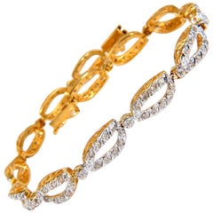 Bracelet en or 14 carats avec diamants à motif de feuilles ouvertes de 1,40 carat