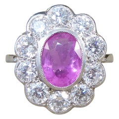 1.40 Carat Pink Sapphire and 1.40 Carat Total Diamond Cluster Ring in Platinum