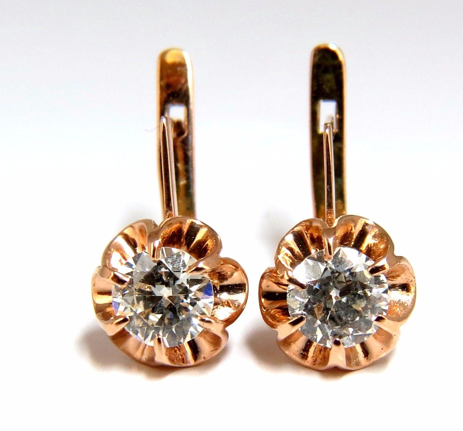 Victorian Stud & Lever Clip

1.40ct. Round, Old mine cut diamond earrings 

H-color

Vs-2 clarity.

Each diamond: 5.8mm

4.4 grams.

Natural, No Enhancements.

14kt rose gold

$8000 Appraisal Certificate to accompany