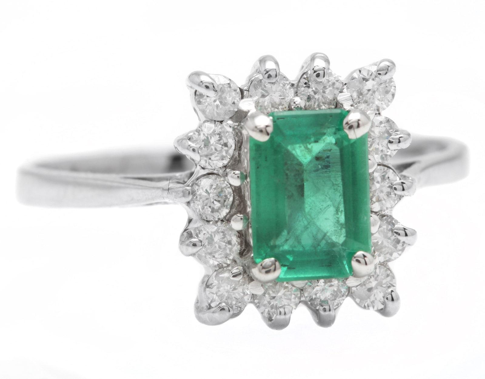 1.40 Carats Natural Emerald and Diamond 14K Solid White Gold Ring

Suggested Replacement Value: Approx. $3,500.00

Total Natural Green Emerald Weight is: Approx. 1.00 Carats (transparent)

Emerald Measures: Approx. 7 x 5mm

Emerald Treatment:
