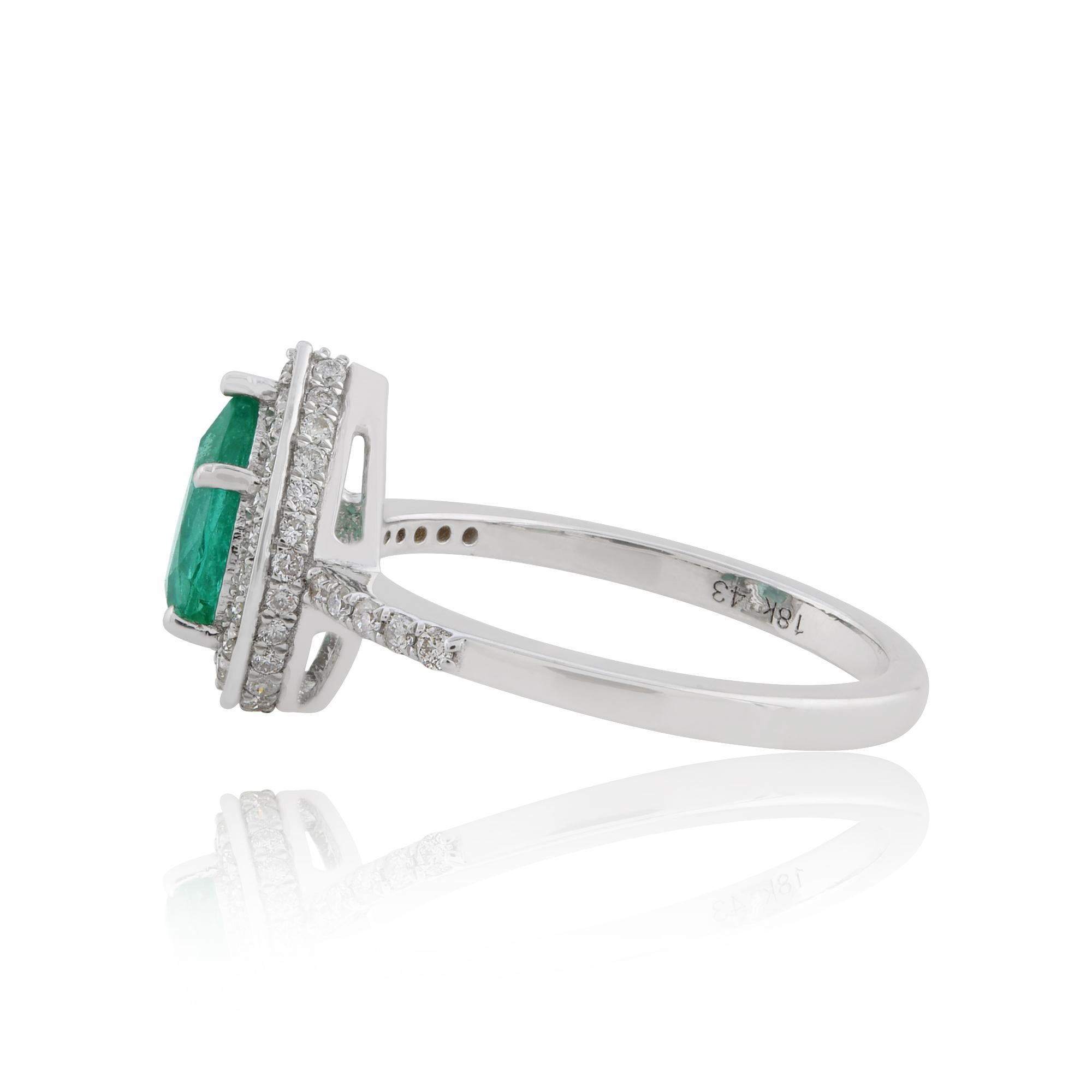 Dieser exquisite Ring aus 18-karätigem Gold ist mit einem sambischen Smaragd von 1,00 Karat und 0,40 Karat funkelnden Diamanten besetzt.

Der Ring hat die Größe 7 US und kann auf Anfrage größer oder kleiner gemacht werden. FOLLOW SPECTRUM JEWELS