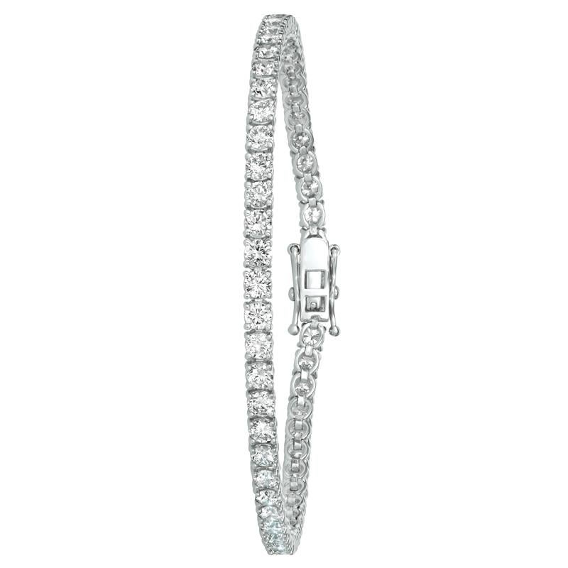 100% naturale, non valorizzato in alcun modo Bracciale tennis con diamanti taglio rotondo 
14.00CT
G-H 
SI  
Oro bianco 14K, incastonato  7,10 grammi
7 pollici di lunghezza, 5 mm di larghezza 
35 diamanti, ogni diamante corrisponde a 40