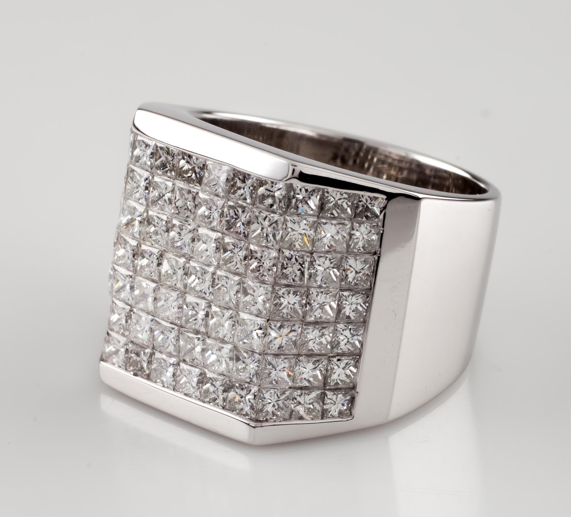 Large 18k White Gold Diamond Plaque Ring
Features Beveled Plaque of Invisible-Set Princess Cut Diamonds
Dimensions of Plaque = 18 mm Long
Center Section = 15 mm Wide, Wing Sections = 7.5 mm Wide
Total Diamonds Weight: Approximately 14