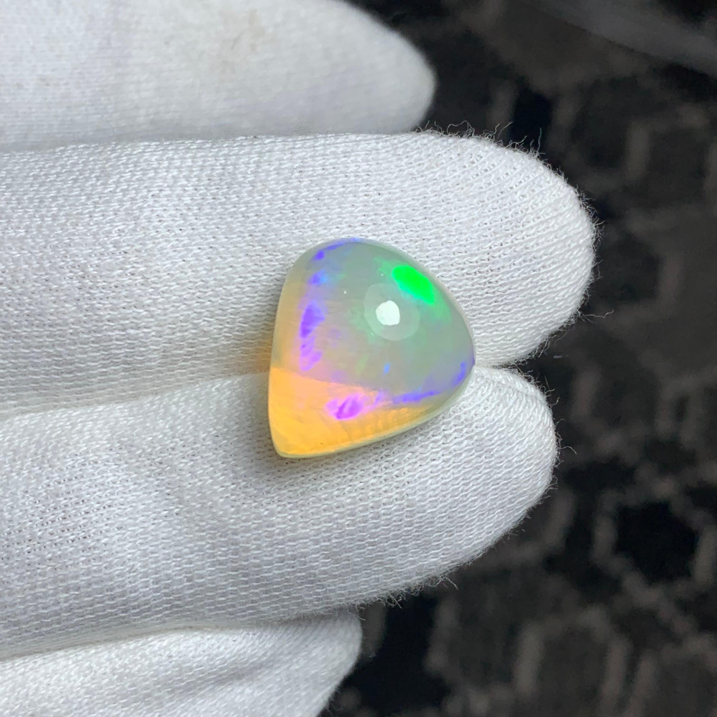 Loose Opal Cabochon 

Weight: 14.00 Carats 
Dimension: 17.5 x 15.6 x 11 Mm
Origin: Ethiopia 
Treatment: Non 
Certificate: On Customer Demand 


Opal is a mesmerizing gemstone celebrated for its vibrant play-of-color, where shifting hues of the