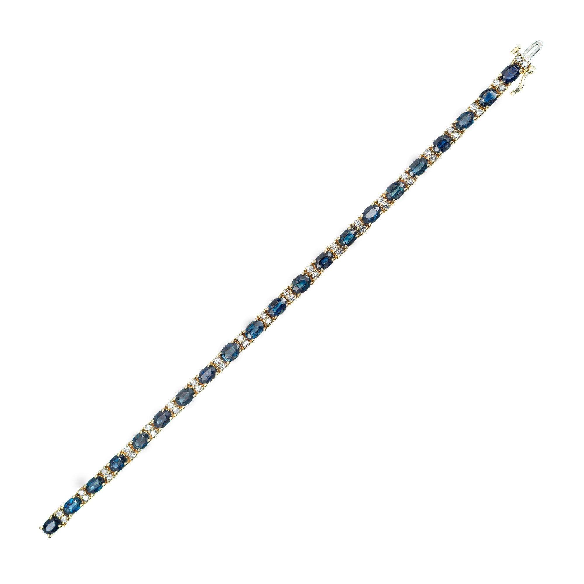 Sapphire and diamond hinged link bracelet. 21 oval sapphires separated by 42 single cut diamonds in a 14k yellow gold tennis bracelet setting. 7.75 inches long. 

21 genuine 6 x 4.5mm Royal blue Sapphires. Approx. 14.00cts total, natural color
