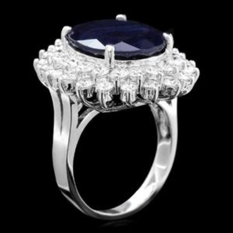 14.00 Carats Natural Sapphire and Diamond 14K Solid White Gold Ring

Total Natural Oval Cut Sapphire Weights: Approx. 12.00 Carats

Sapphire Measures: Approx. 15.00 x 13.00mm

Sapphire Treatment: Diffusion

Natural Round Diamonds Weight: Approx.