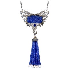 140,29 carati di tanzanite, zaffiro, perla e collana di diamanti ad ali di nappe
