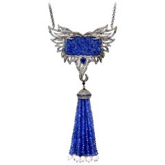 Collier à pampilles avec tanzanite, saphir, perle et diamants 140,29 carats